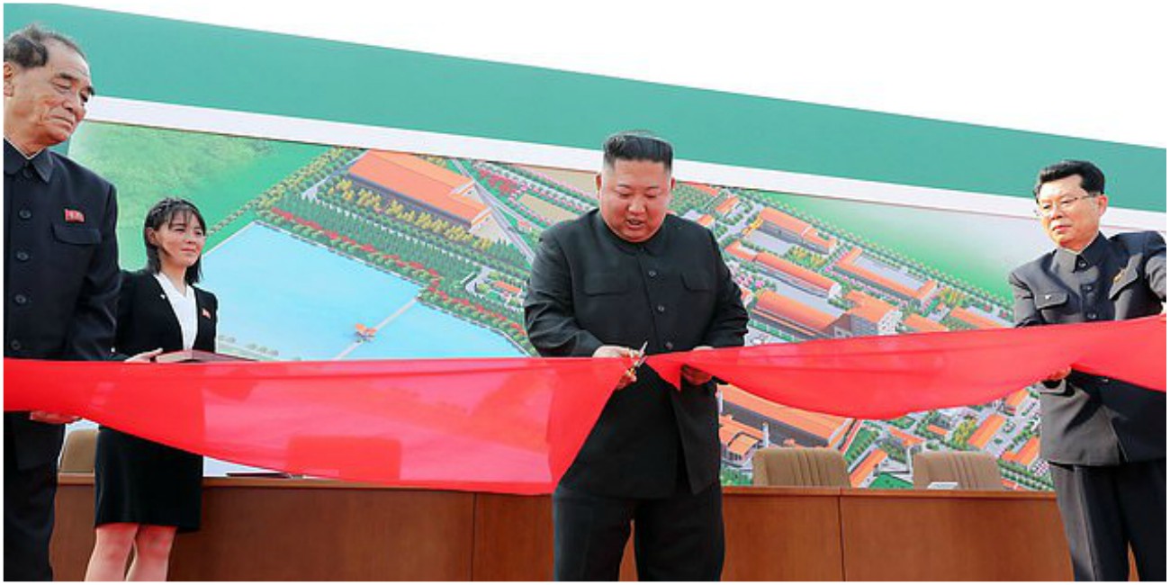 Kim Jong Un cuts the ribbon at the phosphate fertilizer factory 