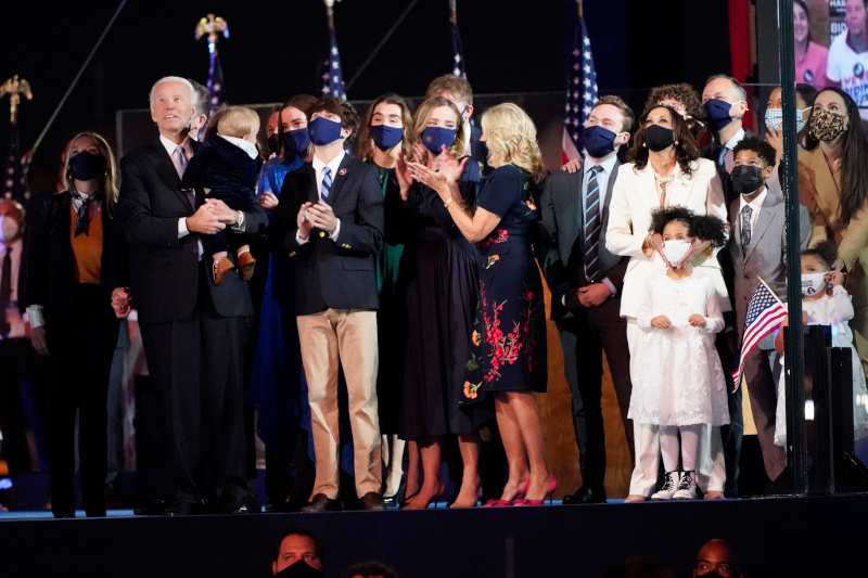 The Biden and Harris families on stage