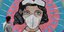 Καλλιτέχνης σχεδίασε σε τοίχο της Γερμανίας μια νοσοκόμα με μάσκα λόγω κορωνοϊού 