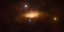 καλλιτεχνική απεικόνιση που δείχνει τον αυξανόμενο δίσκο υλικού που έλκεται από τη μαύρη τρύπα και κάνει τον γαλαξία να λάμπει. Credit: ESO/M. Kornmesser