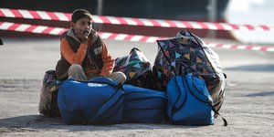 Προσφυγόπουλο με μπαγκάζια