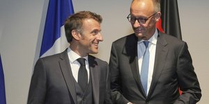 Ο Γάλλος πρόεδρος Εμανουέλ Μακρόν και ο Γερμανός καγκελάριος Φρίντριχ Μερτς